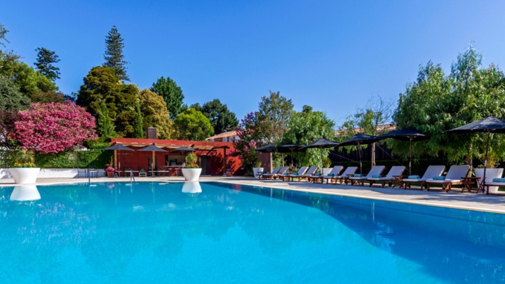 Hotel Quinta das Lagrimas - Small Luxury Hotels Coimbra Esterno foto The swimming pool at the hotel