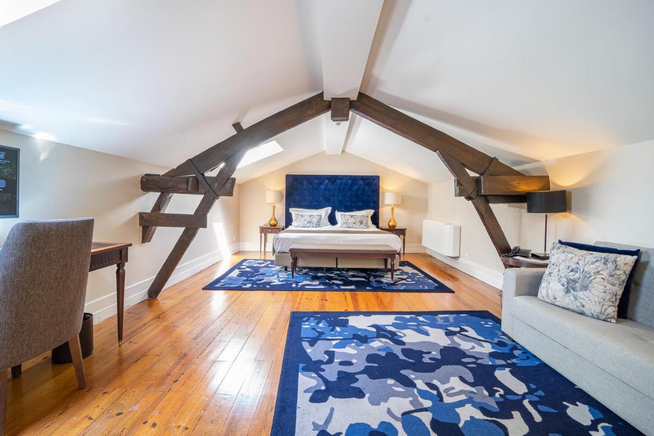 Hotel Quinta das Lagrimas - Small Luxury Hotels Coimbra Esterno foto The bedroom of the suite