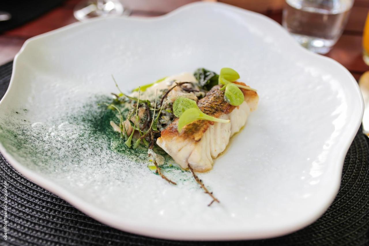 Hotel Quinta das Lagrimas - Small Luxury Hotels Coimbra Esterno foto A dish at the restaurant