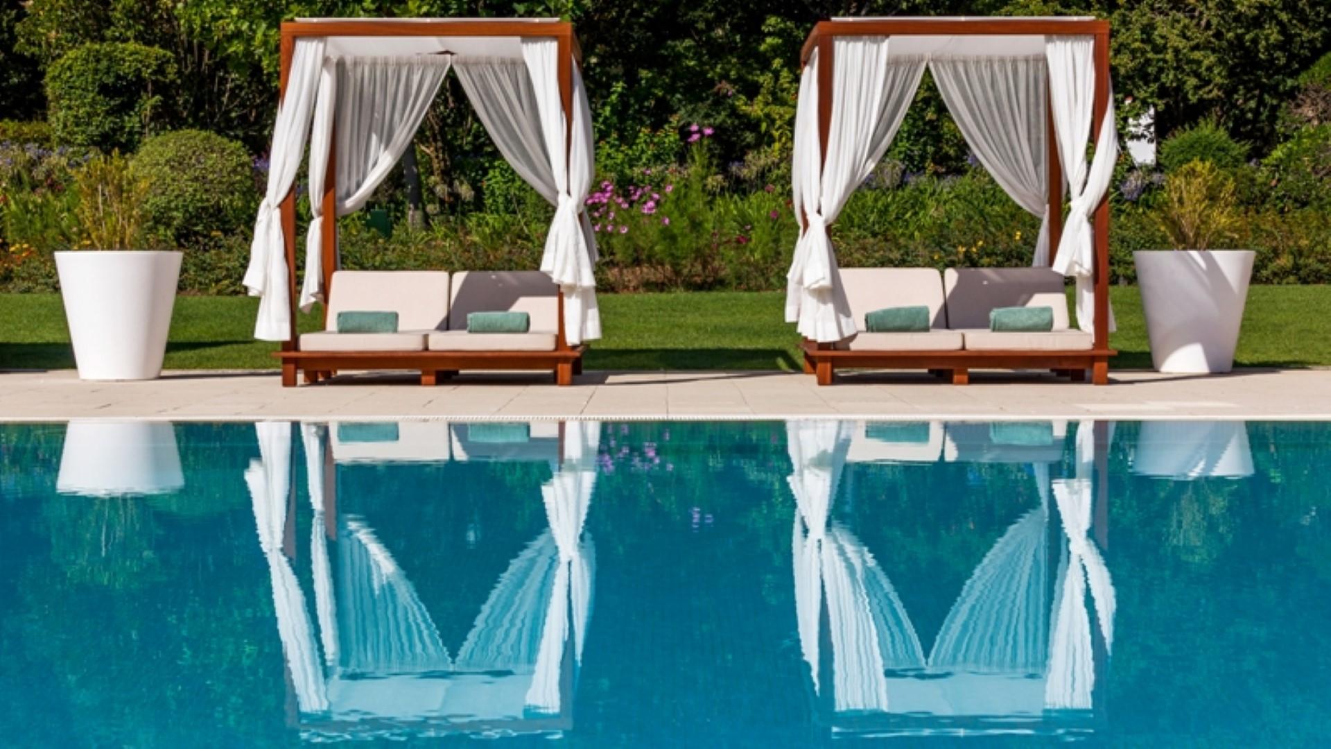 Hotel Quinta das Lagrimas - Small Luxury Hotels Coimbra Esterno foto Cabanas at a resort