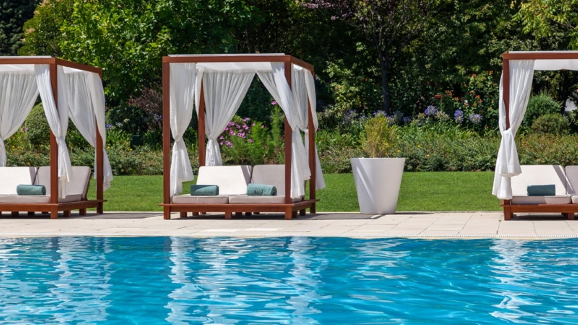 Hotel Quinta das Lagrimas - Small Luxury Hotels Coimbra Esterno foto The swimming pool at the hotel